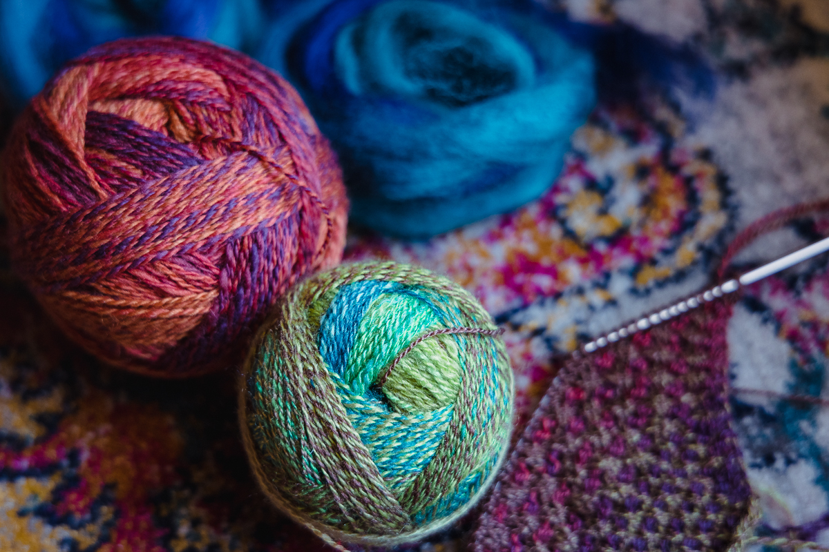 Colourful handspun yarn by Felicia Lo Wong with fibre by SweetGeorgia Yarns